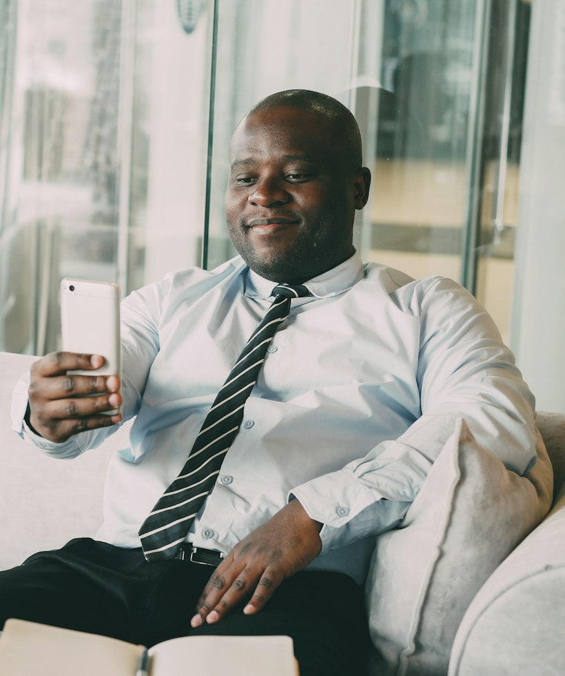 Business owner managing customer conversations on WhatsApp with Whatsoza